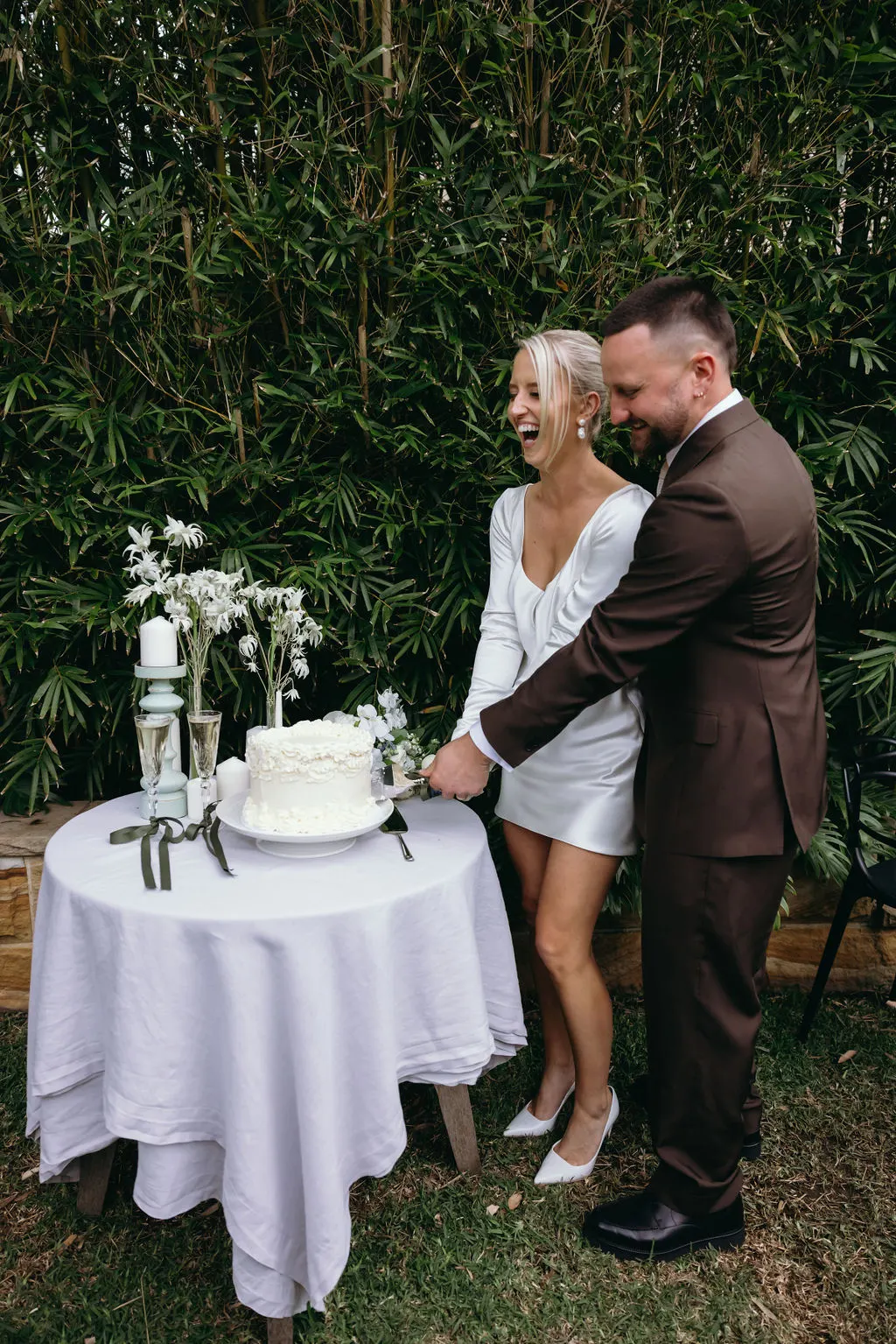 Wedding couple sharing a romantic moment outdoors